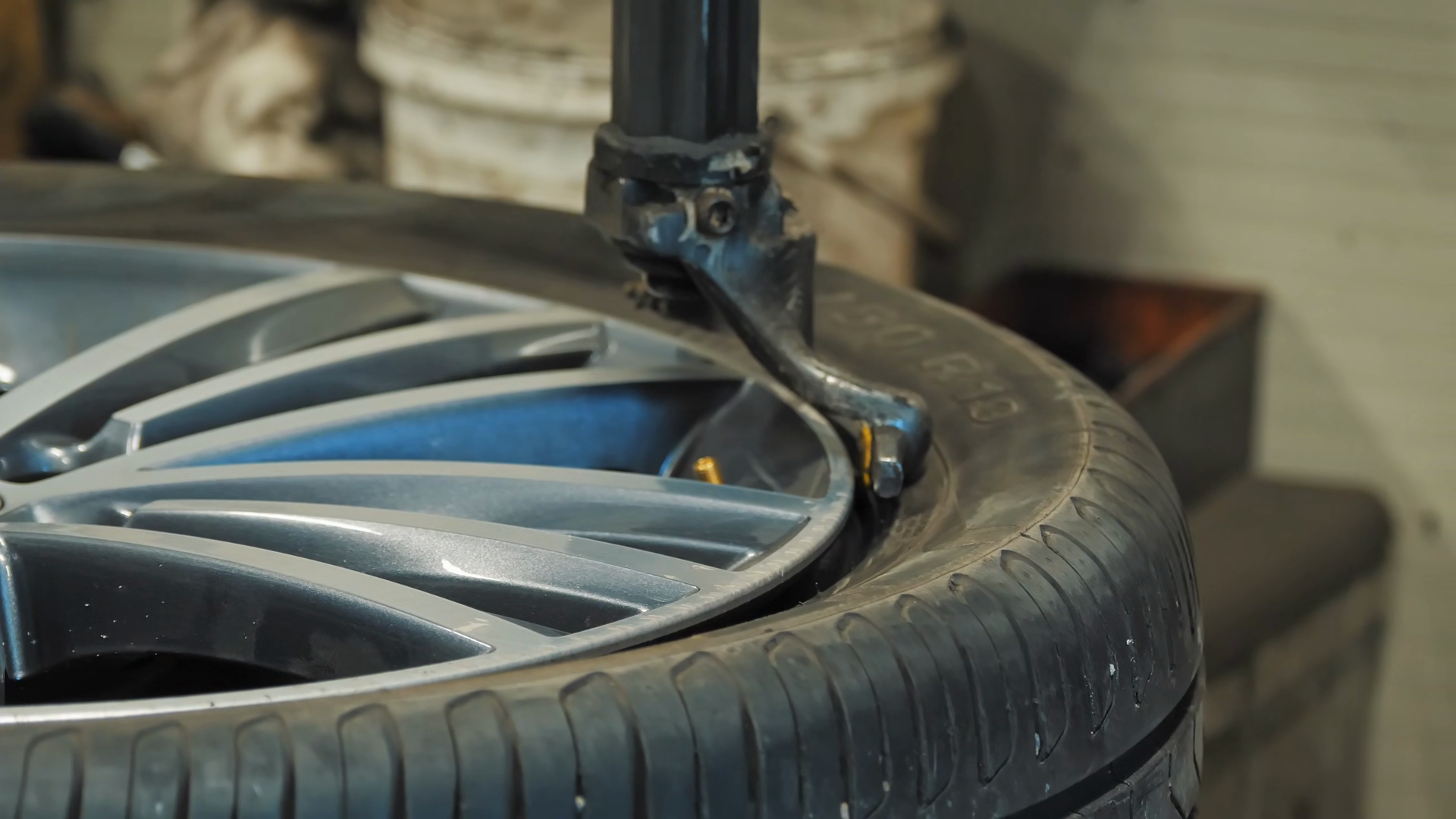 Mechanic Removing Used Tire From Rim Using Stock Footage SBV-353764654 ...