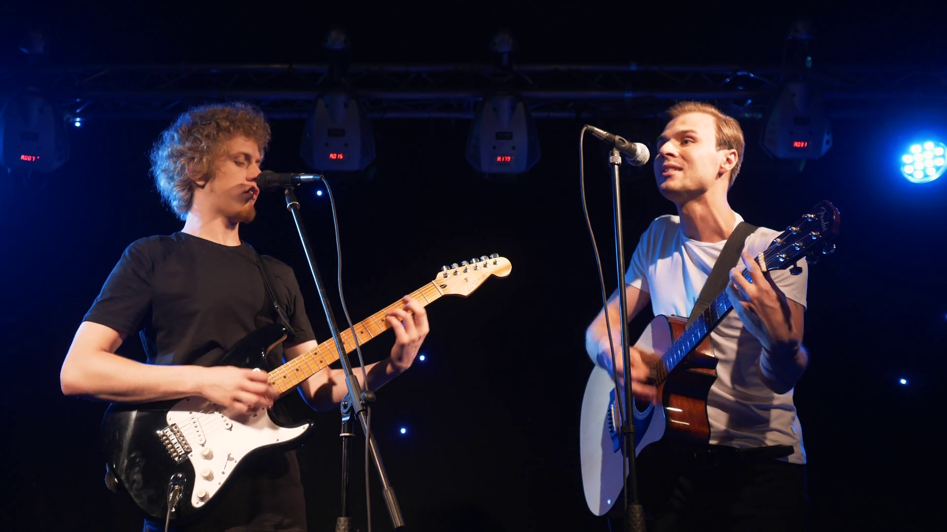 Concert Rock Band Performing On Stage With Stock Footage SBV324573037