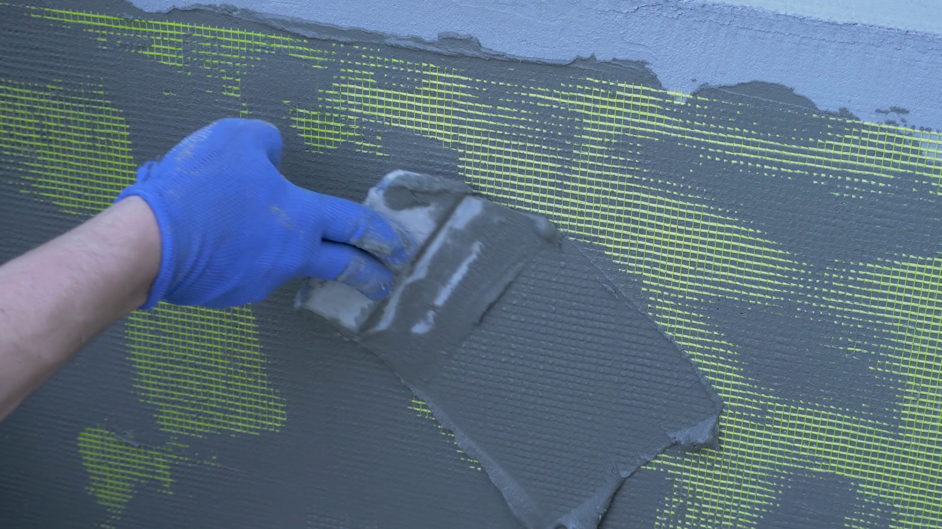 Worker In Blue Gloves Plastering Fiberglass Stock Footage SBV-352733153 ...