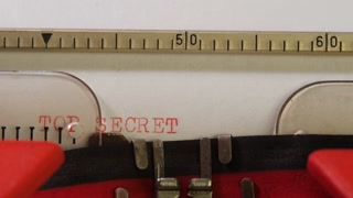 Text TOP SECRET on paper background. Typescript on stationary mechanical typewriter. English report concept. Secret document, confidential information
