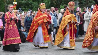 KHARKIV, UKRAINE - JUNE 1, 2021: Christian procession is organized body of people walking ceremonial manner. Group of people. No face masks. Processional banners, clergy, priests with icons, faithful