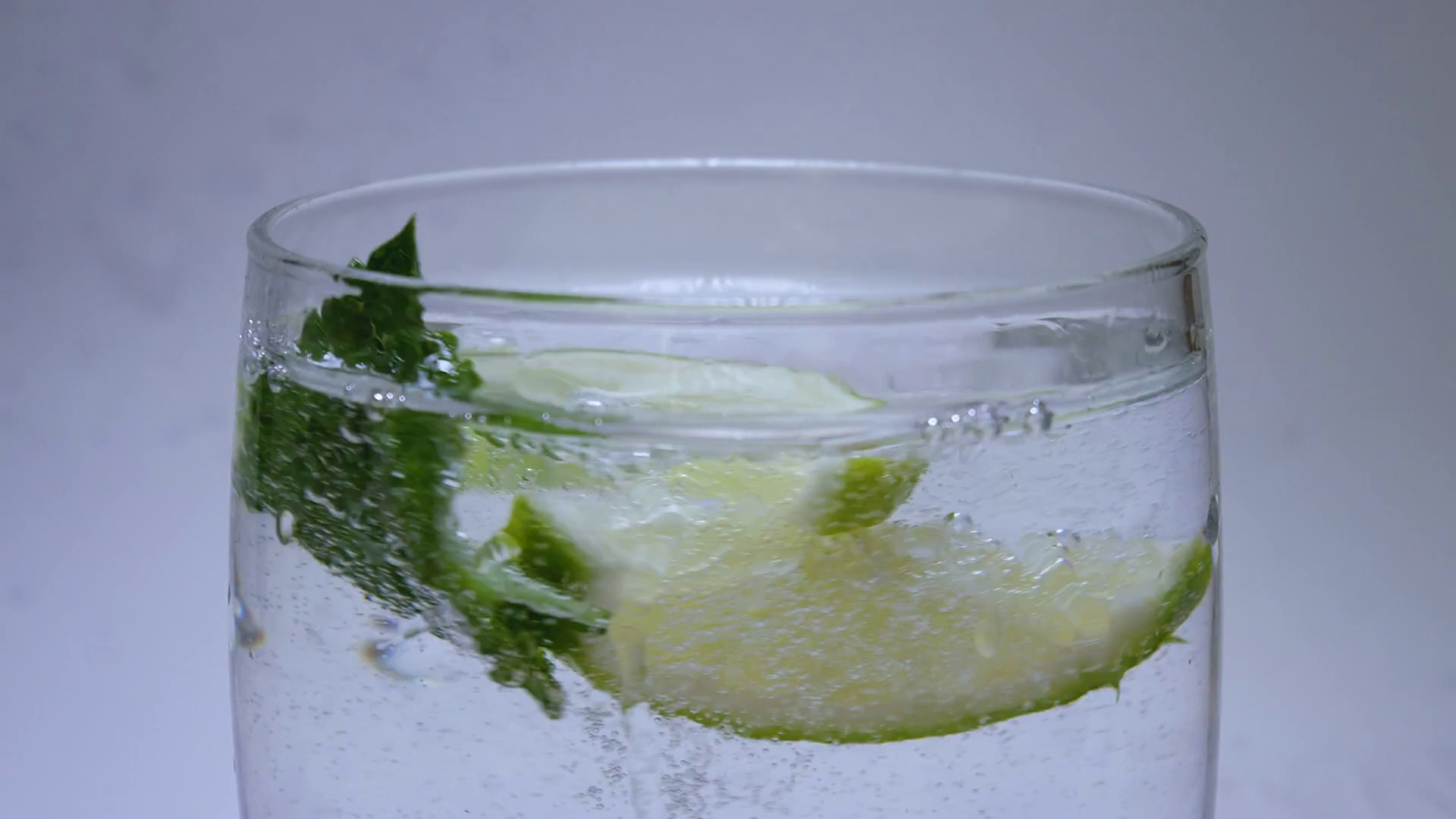 Carbonated Soda Drink With Bubbles Lime Mint Stock Footage SBV