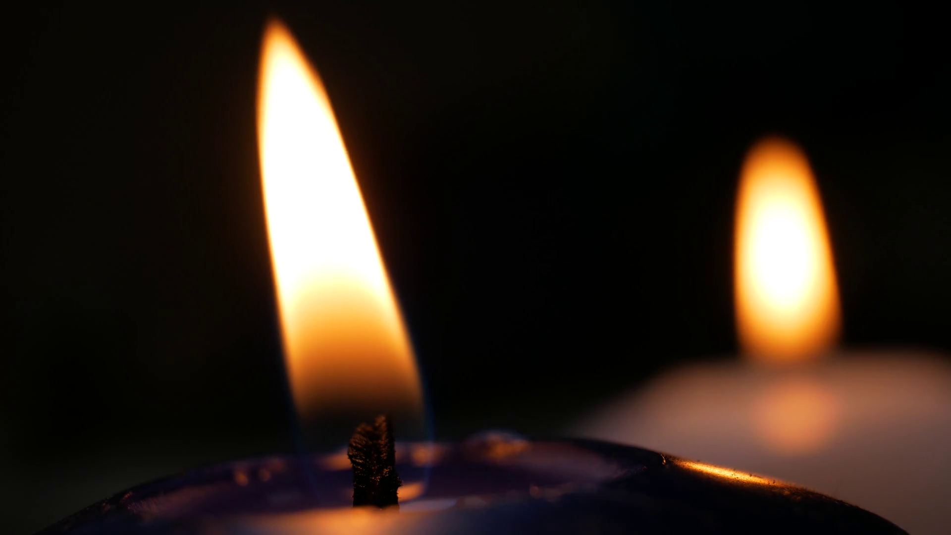 Two White Blue Candles Flame Goes Out In Stock Footage SBV335008007