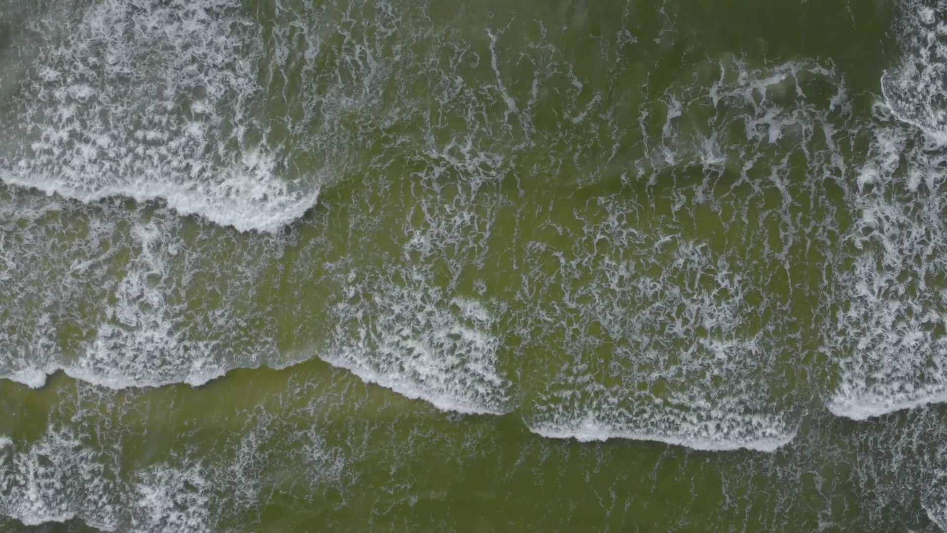 Aerial Top Down View Of Foamy Waves Crashing Stock Footage SBV ...
