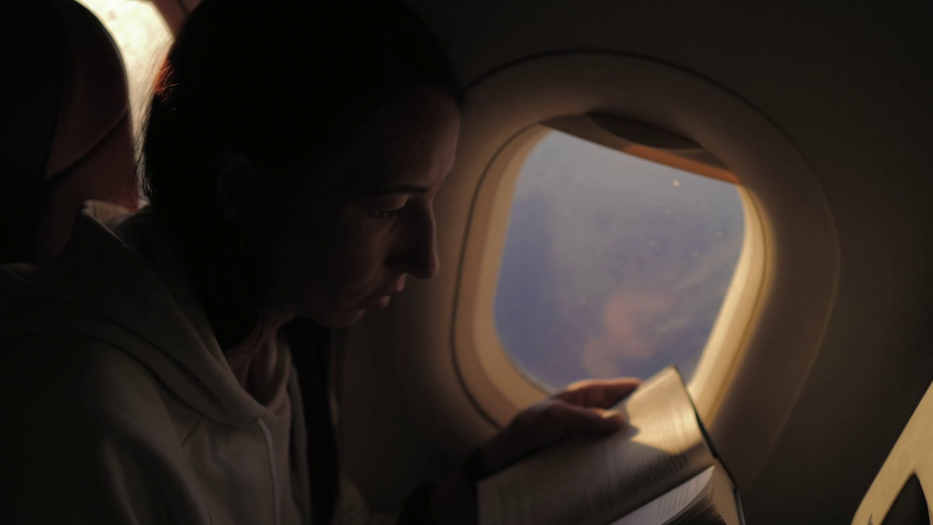 Woman Reading Book Inside Airplane Happy Stock Footage SBV346775570 Storyblocks