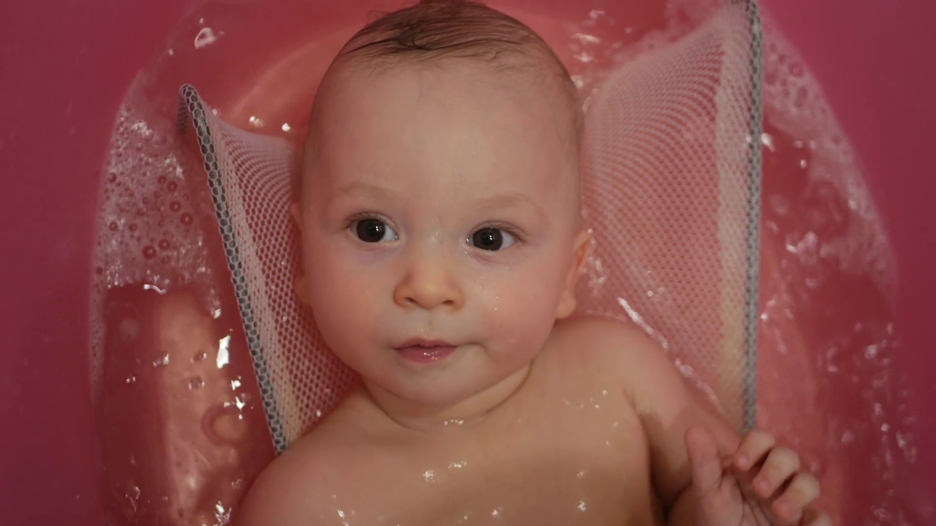 Bath for babies, baby wash your hair. Happy boy taking a bath. Stock
