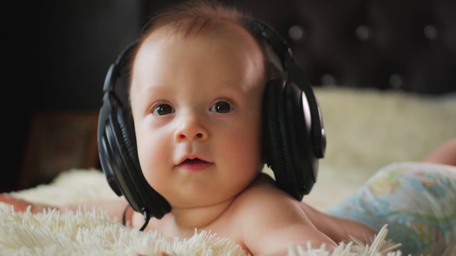 little baby with headphones Stock Video Footage Storyblocks