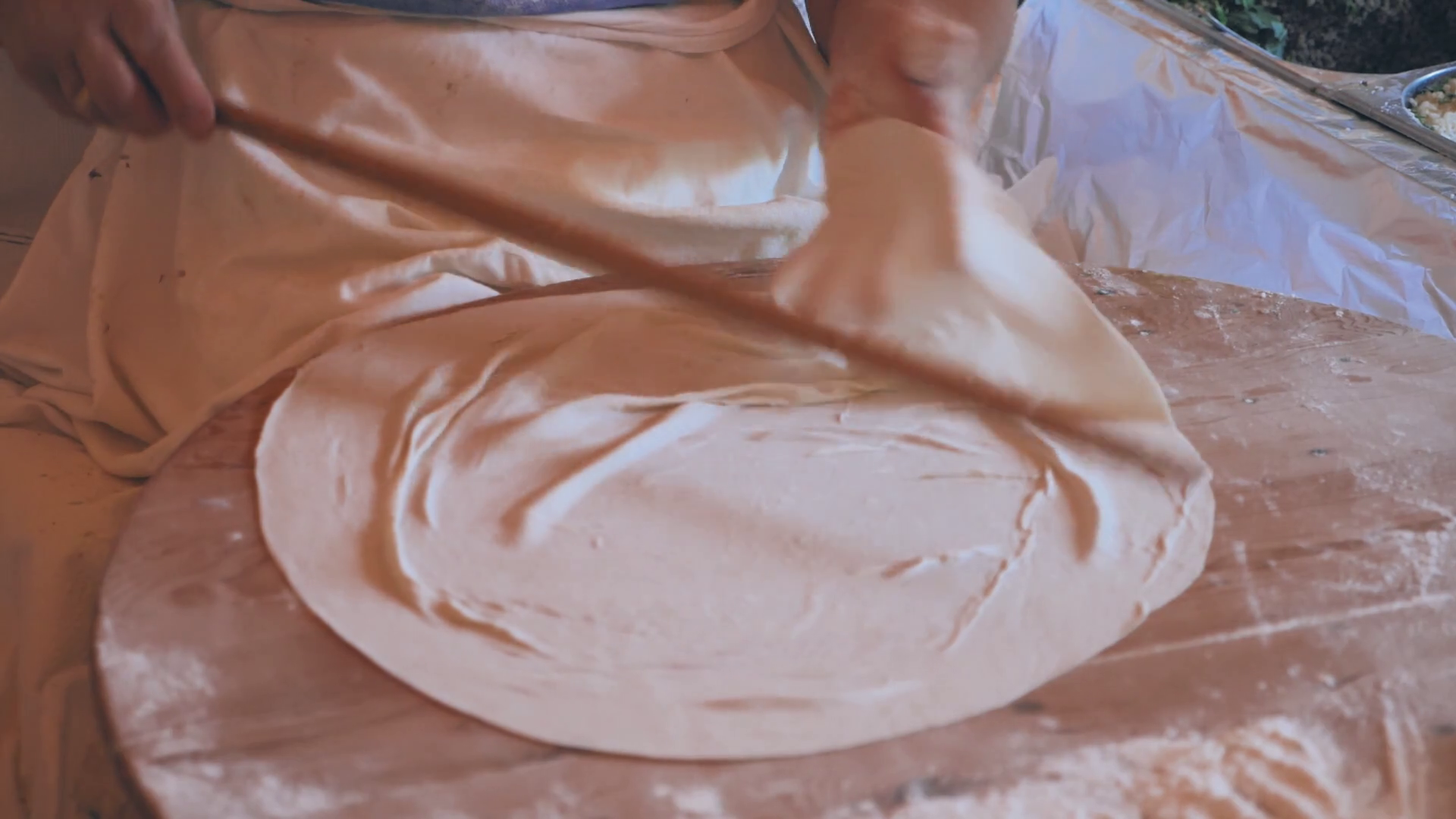 Woman making tortillas in traditional way. Authentic handmade tortillas