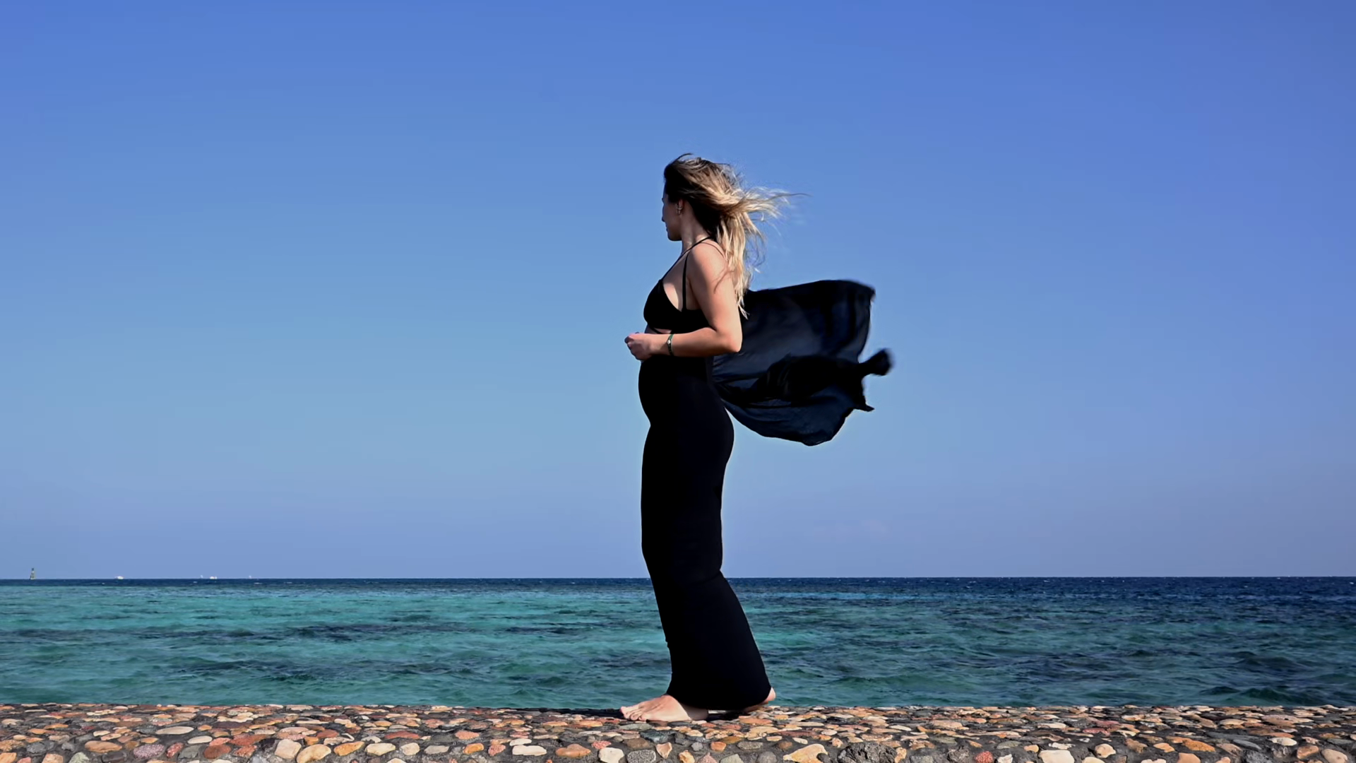 Woman Dances Ocean Wearing Black Swimsuit Stock Footage SBV-353845356 ...