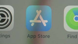 Liverpool, England - July 18, 2024: Close up of Apple App Store on phone home screen 