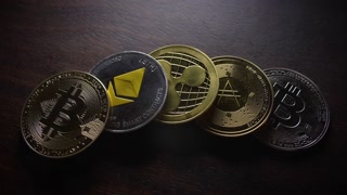 A Variety of Different Cryptocurrency Coins Arranged on a Dark Surface for Display and