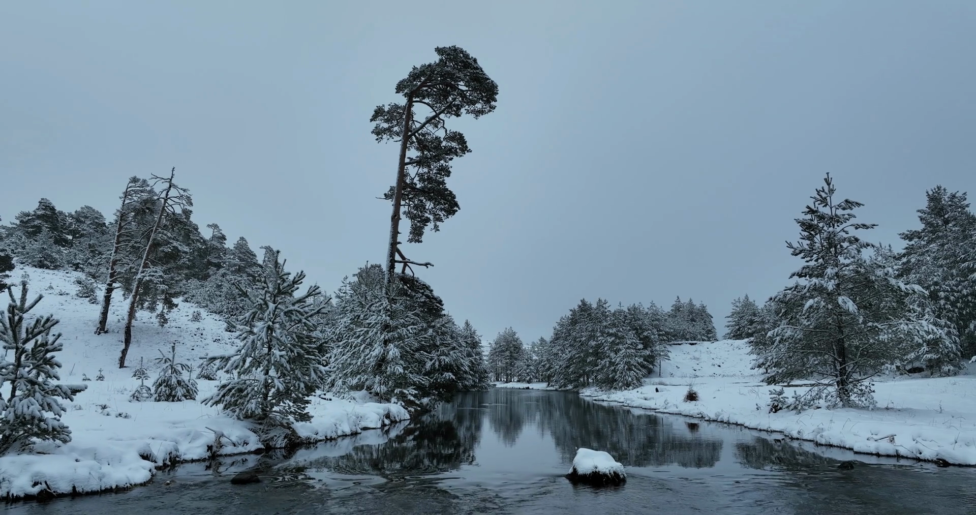 An Aerial View Of Frozen River Flowing Stock Footage SBV-347418588 ...