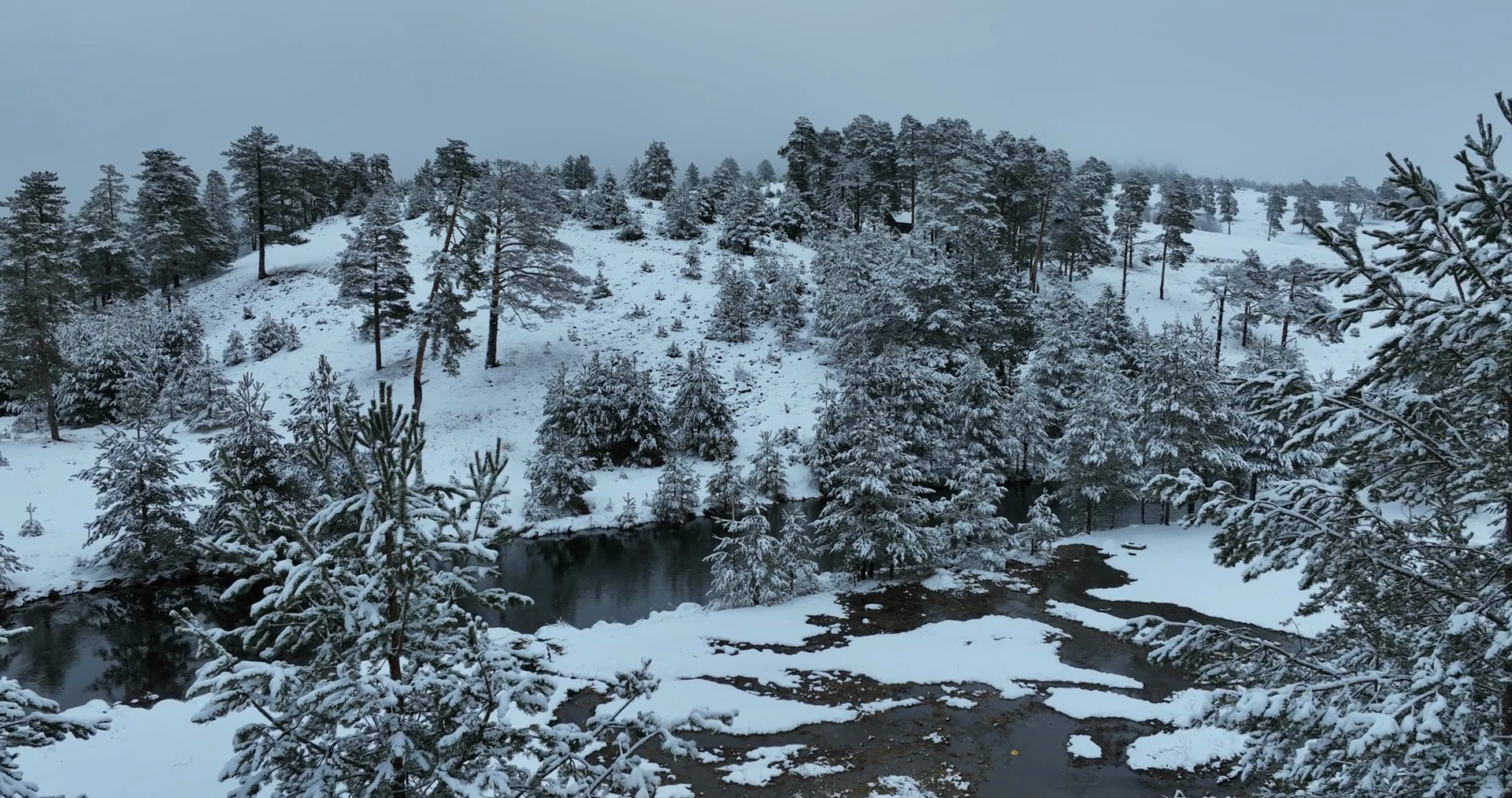 An Aerial View Of Frozen River Flowing Stock Footage SBV-347417836 ...