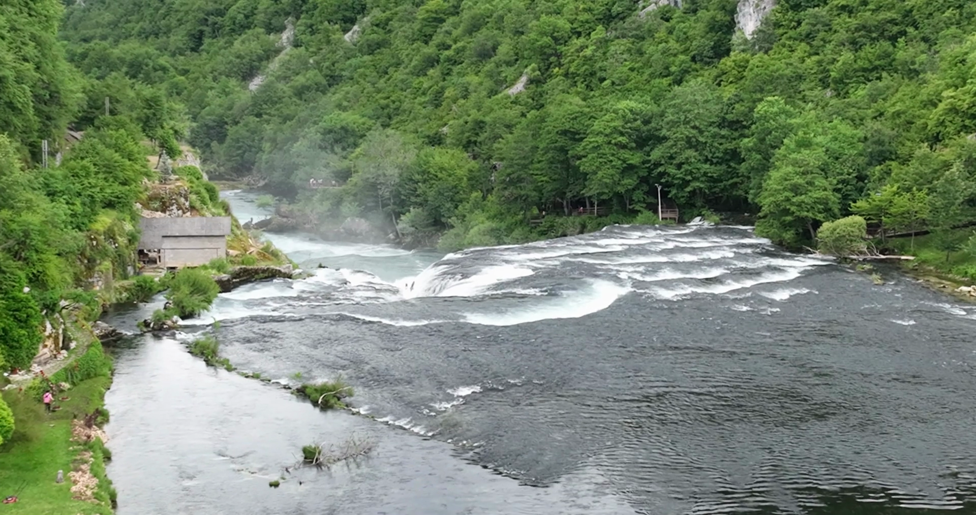 Aerial Shot Of Wild River With Huge Waterfall Stock Footage SBV ...