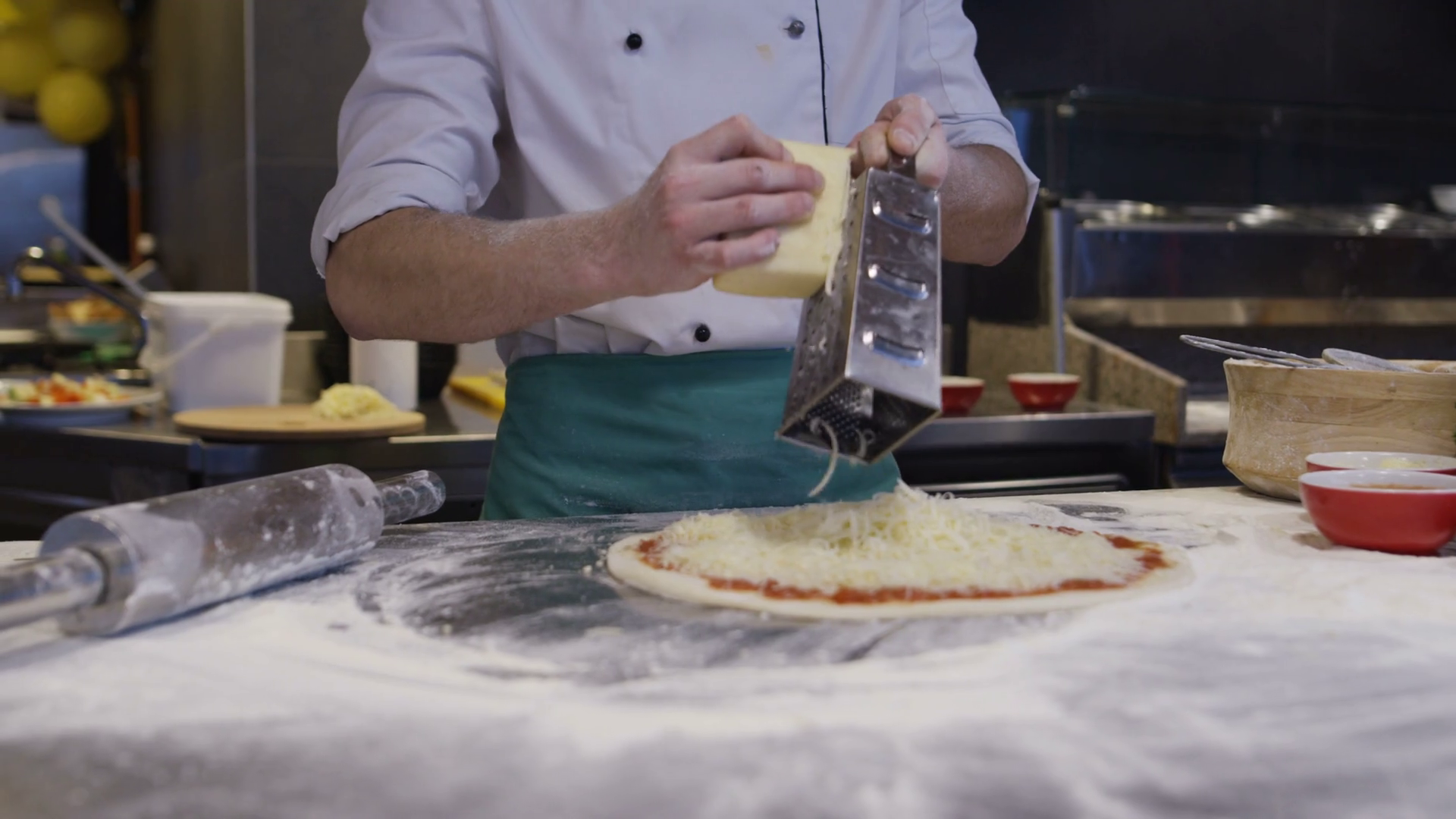 Young Pizza Maker Prepares Pizza In Kitchen Stock Footage SBV325814347