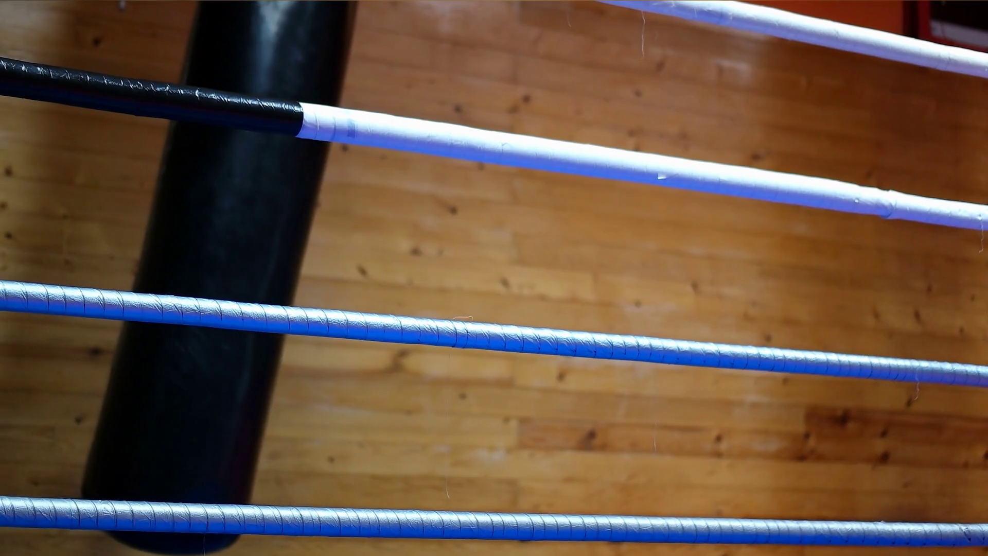 Punching Bag Swings Beside Boxing Ring Stock Footage SBV318440922