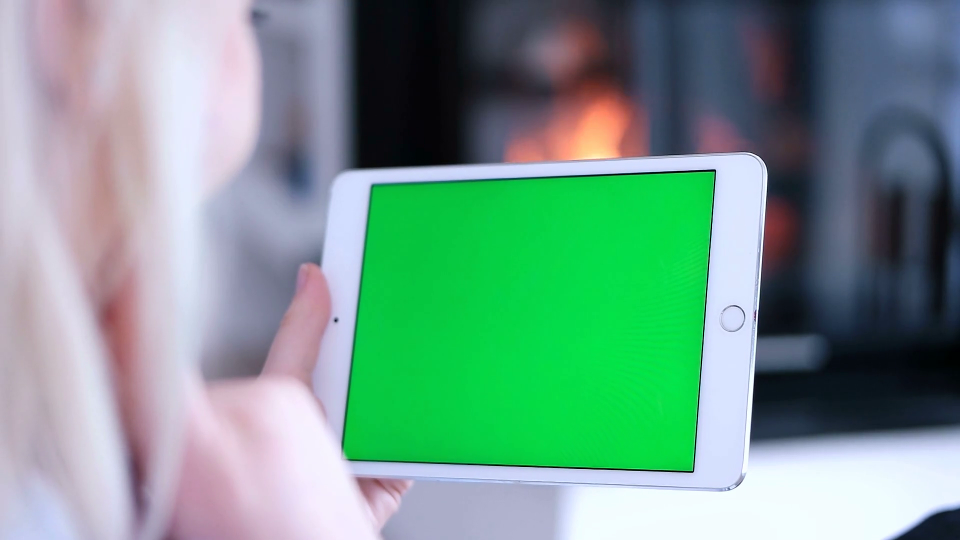 Woman using green screen tablet computer at modern villa Stock Video