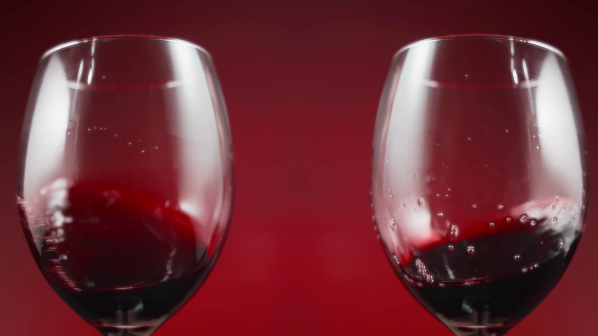 Two Wine Glasses Shaking With Swirling Red Stock Footage SBV347470683 Storyblocks