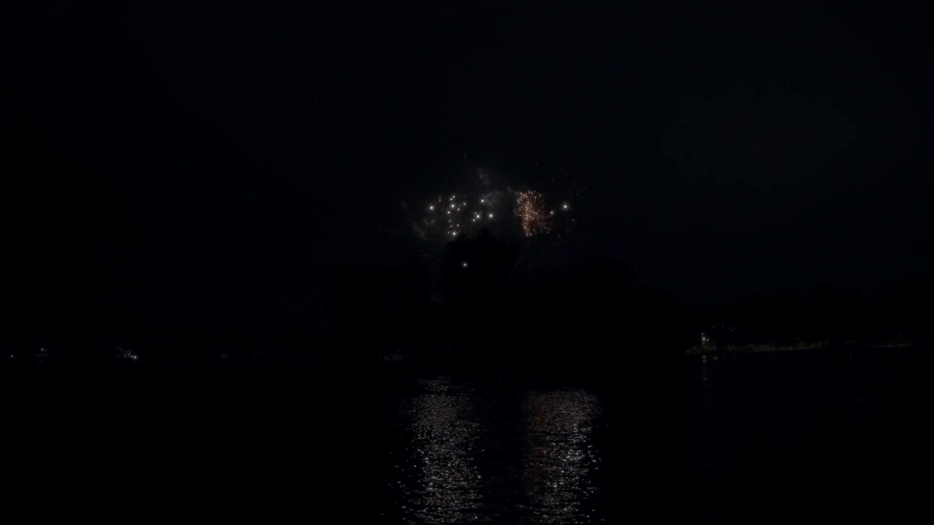 Colorful Fireworks Exploding Above Lake Water Stock Footage SBV ...