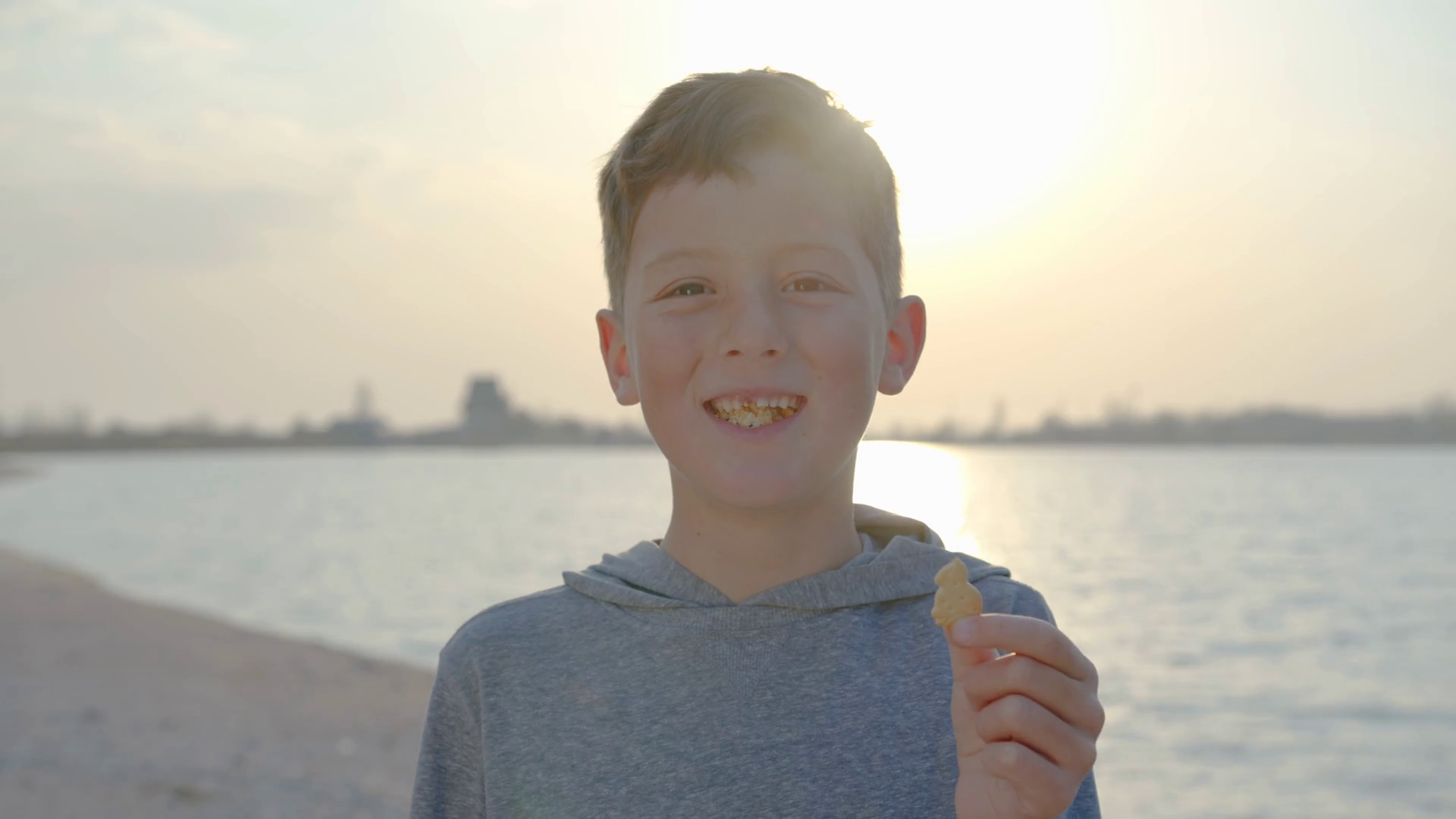 Boy Eating Cracker At Sunset Stock Footage SBV338594508 Storyblocks