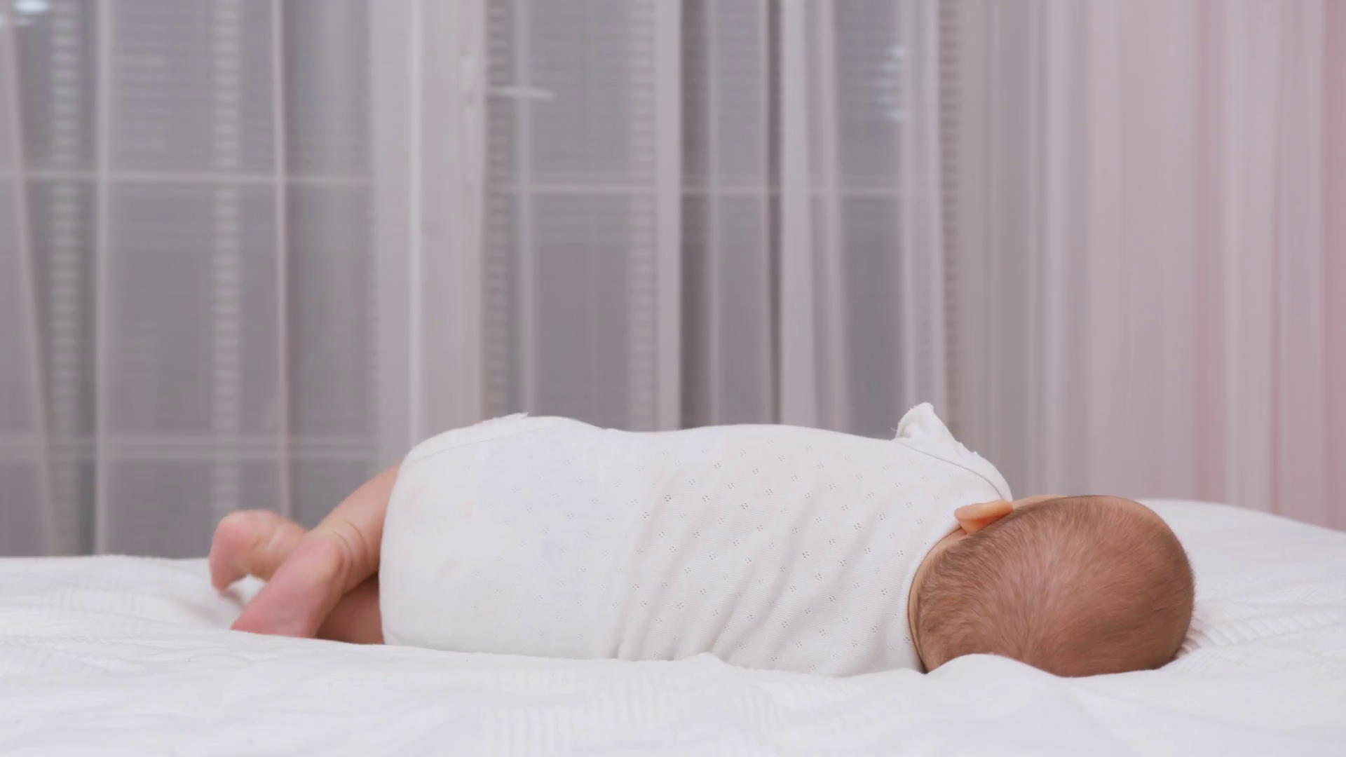 Caucasian Baby Rolling Over Daytime Stock Footage SBV346535982