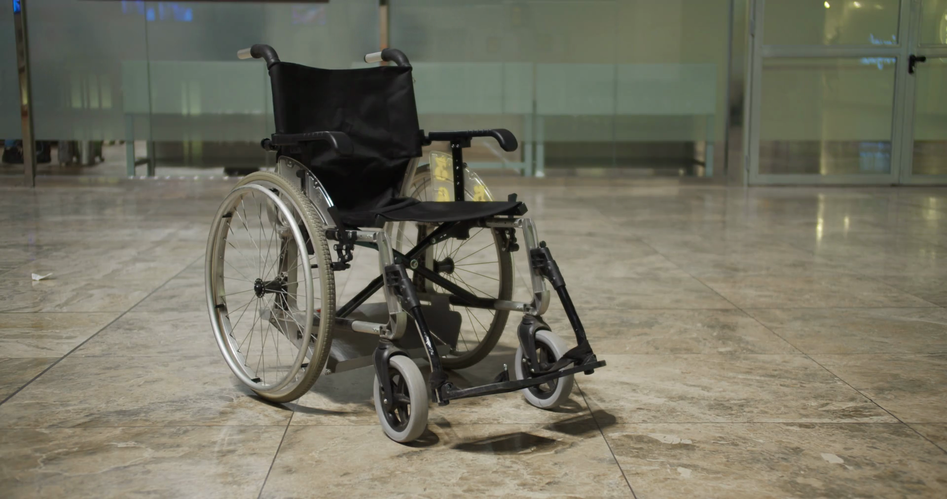 Empty wheelchair. Professional Disability medical equipment For Disabled Patient at airport