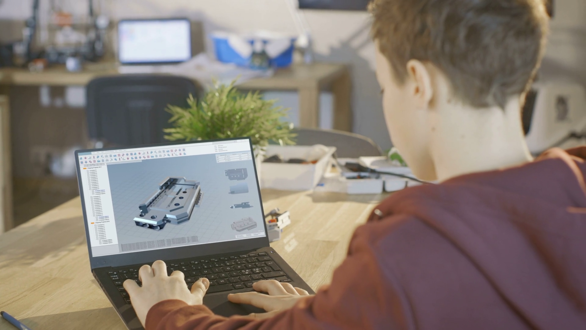 Boy Uses Laptop Computer To Make 3d Designed Stock Footage SBV ...