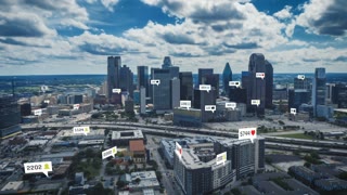 Aerial hyper lapse shot of modern high rise downtown buildings and busy highway leading through city. Dallas, Texas, USA. Computer added visual effects
