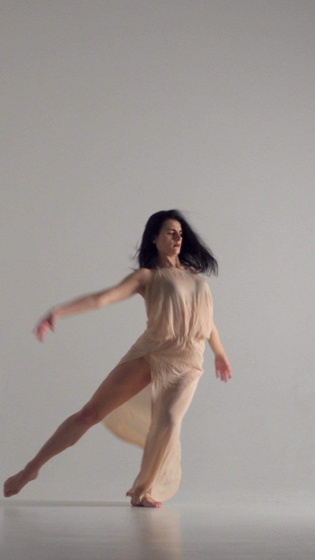 Woman Dancing In Beige Dress To Music On Stock Footage SBV-353270330 ...
