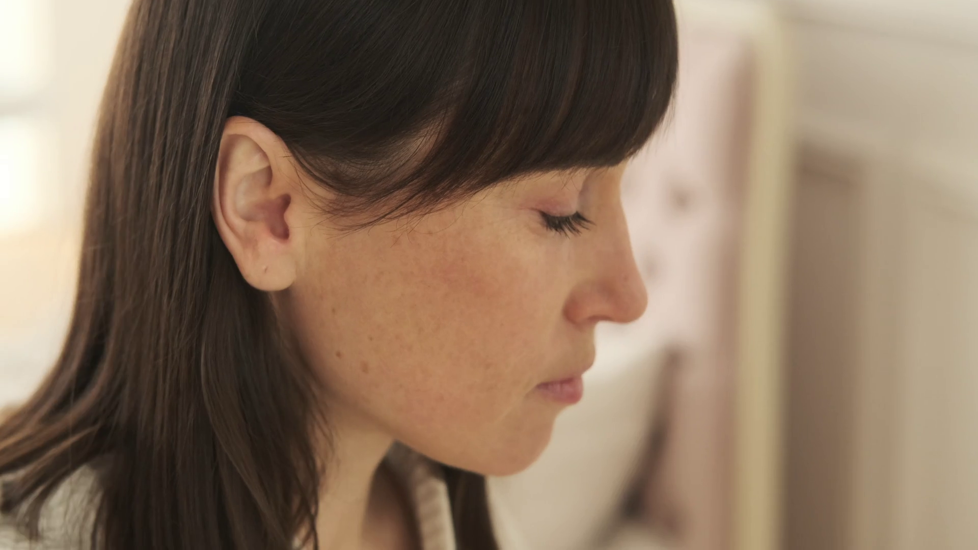 Extreme Close Up Of Woman Cleaning Ears With Stock Footage SBV