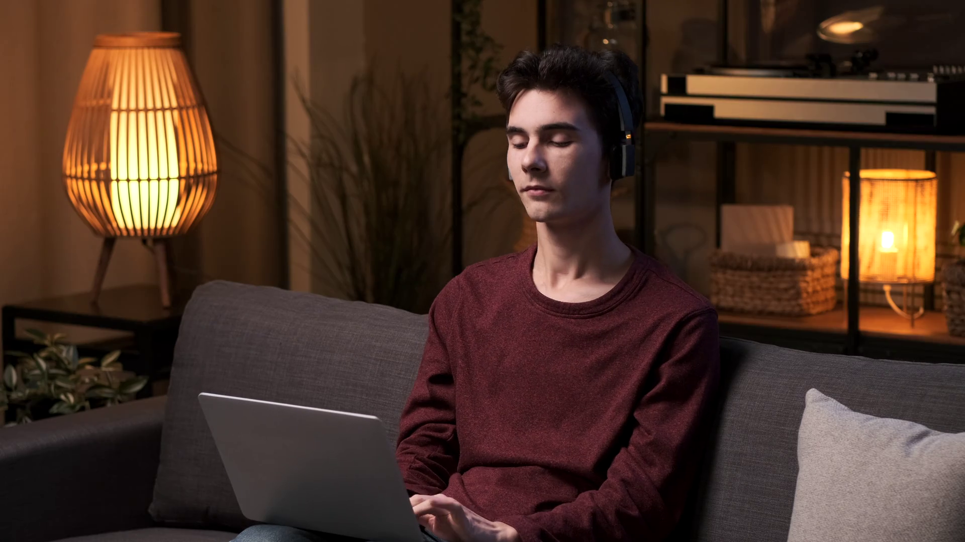 Freelancer With Laptop Headphones On Sofa Stock Footage SBV-348811105 ...