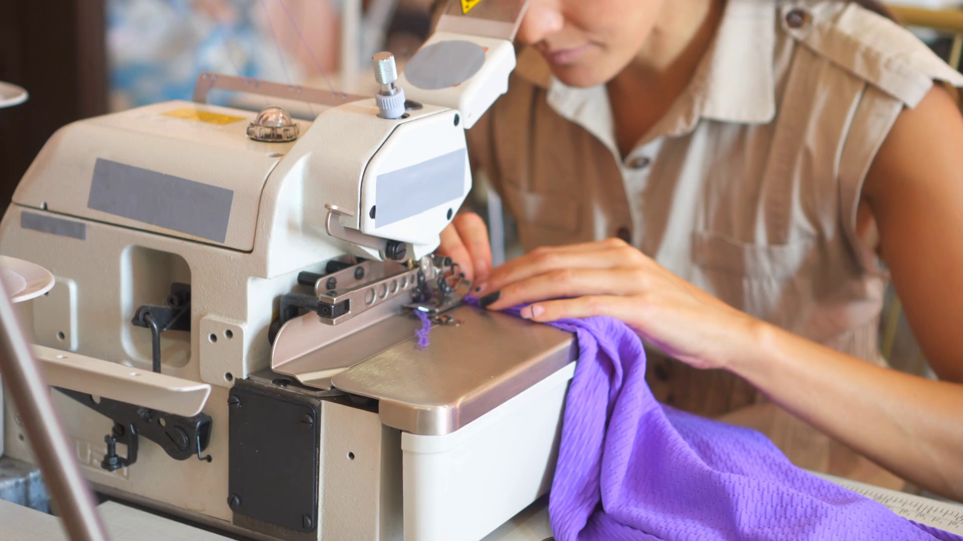 Dressmaker working on sewing machine Stock Video Footage 0029 SBV