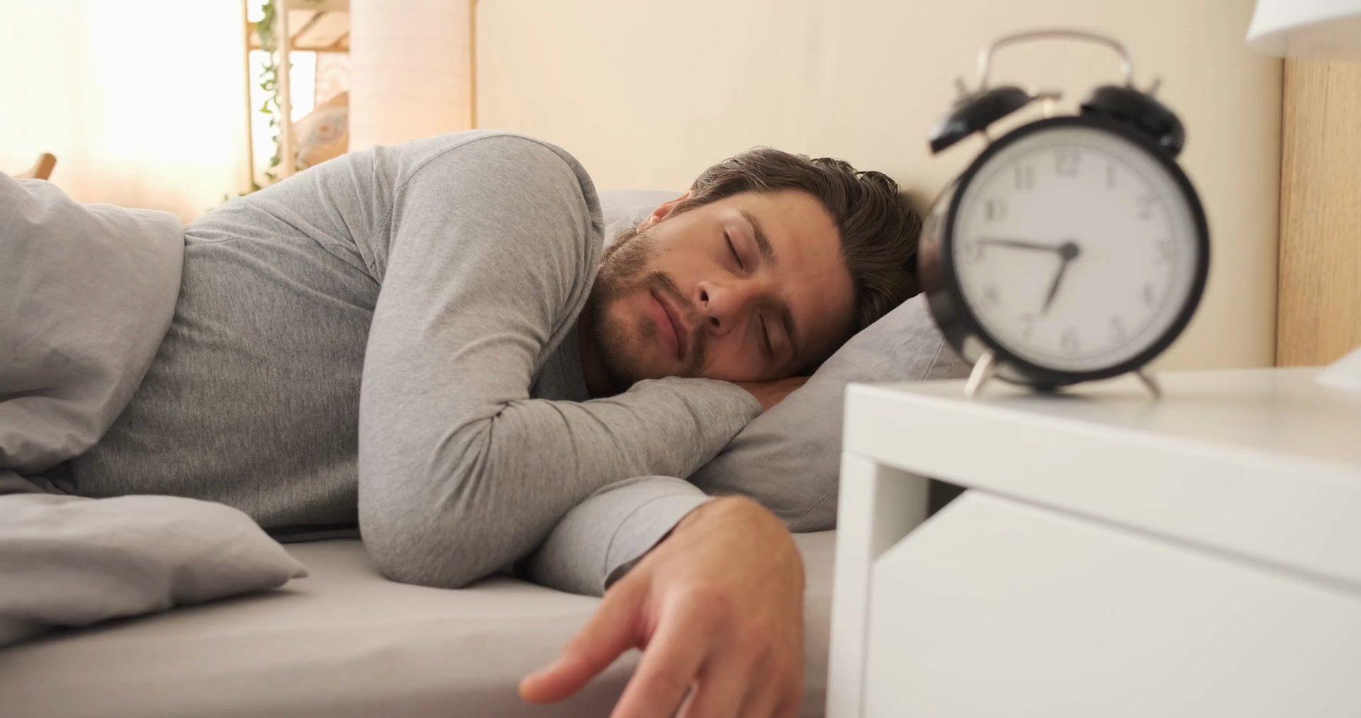 Man Turning Alarm Clock Off In Morning Stock Footage SBV337625516