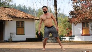 Fit man training outdoors