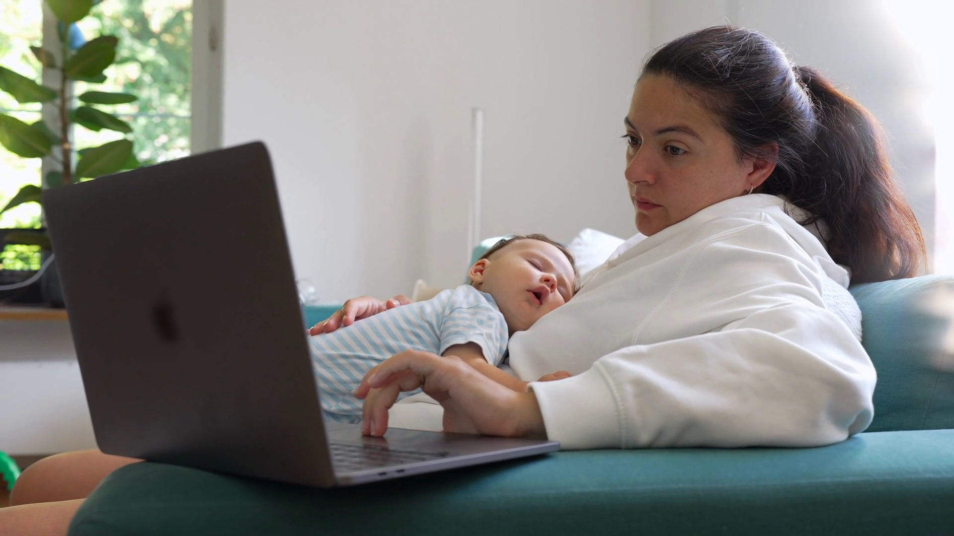 Mother Multitasking With Sleeping Baby On Stock Footage SBV-351901655 ...