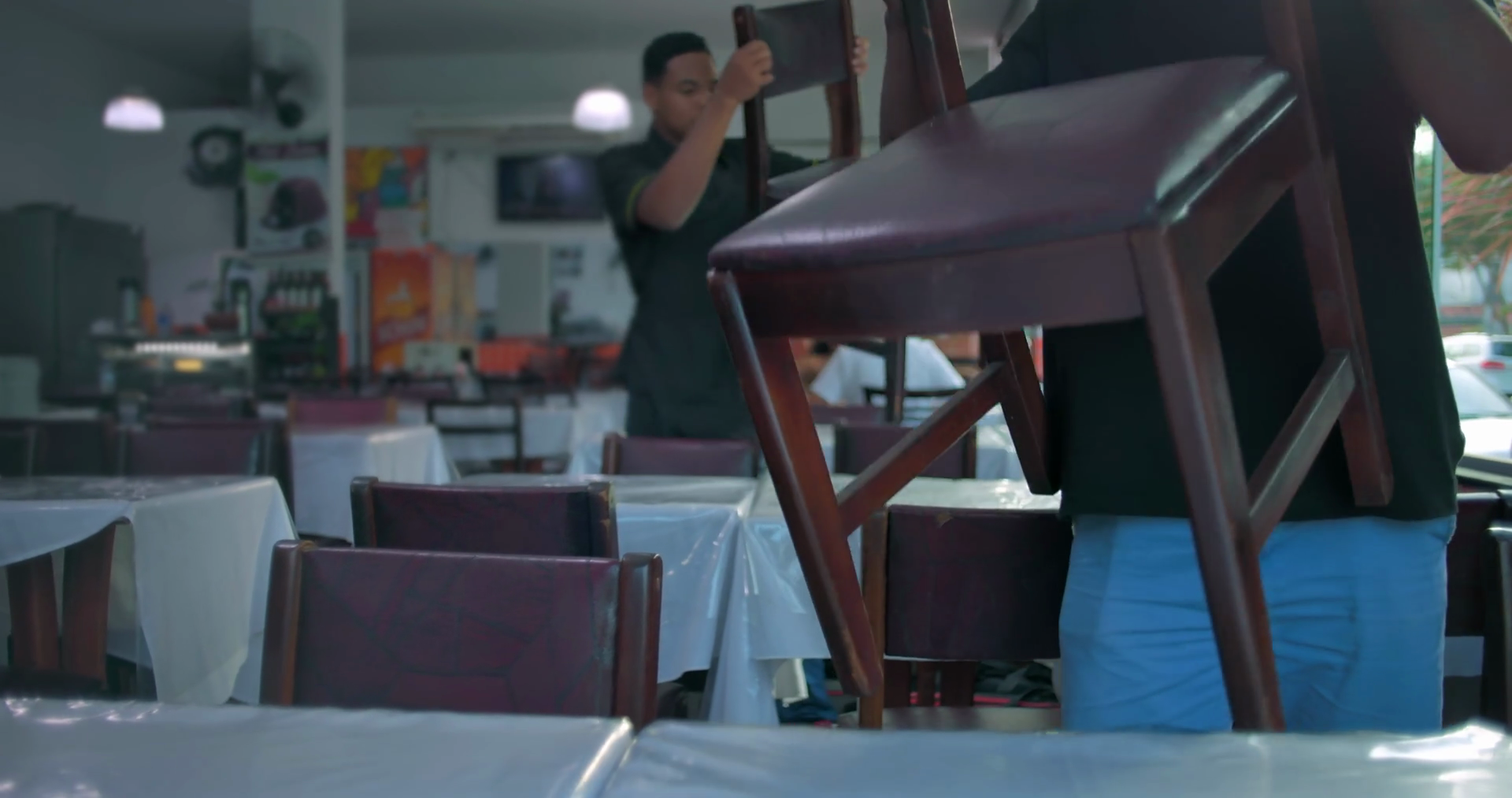 Restaurant Workers Putting Chairs On Top Of Stock Footage SBV 352151150 