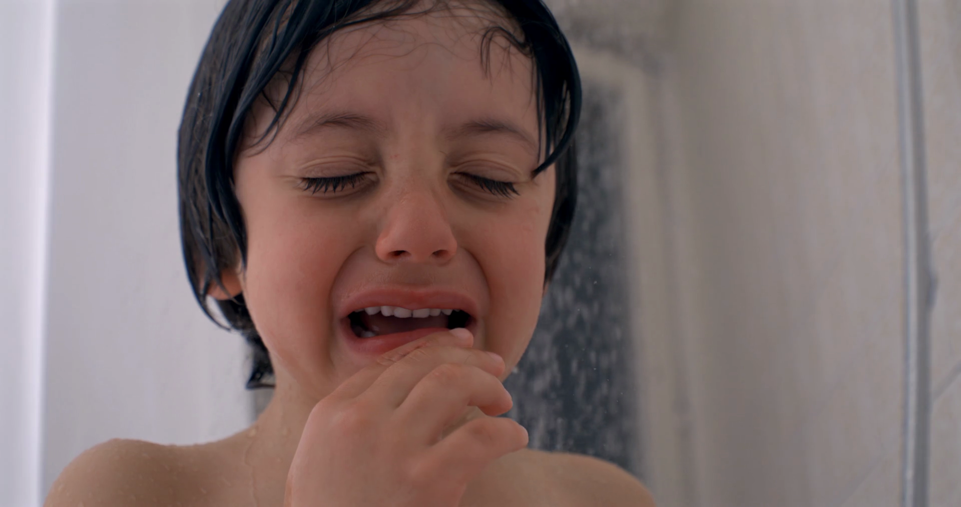 Young Child Crying Under Shower Captured In Stock Footage SBV-351852085 ...