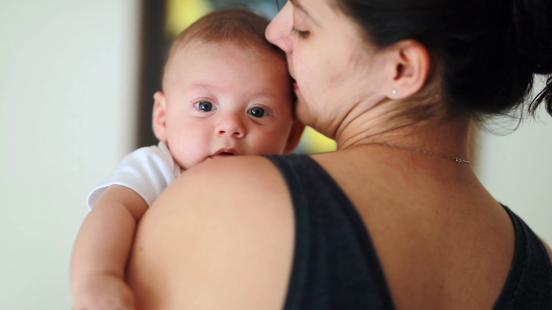 Gaze Of Love Baby Held Mom Locking Eyes Stock Footage SBV348423401