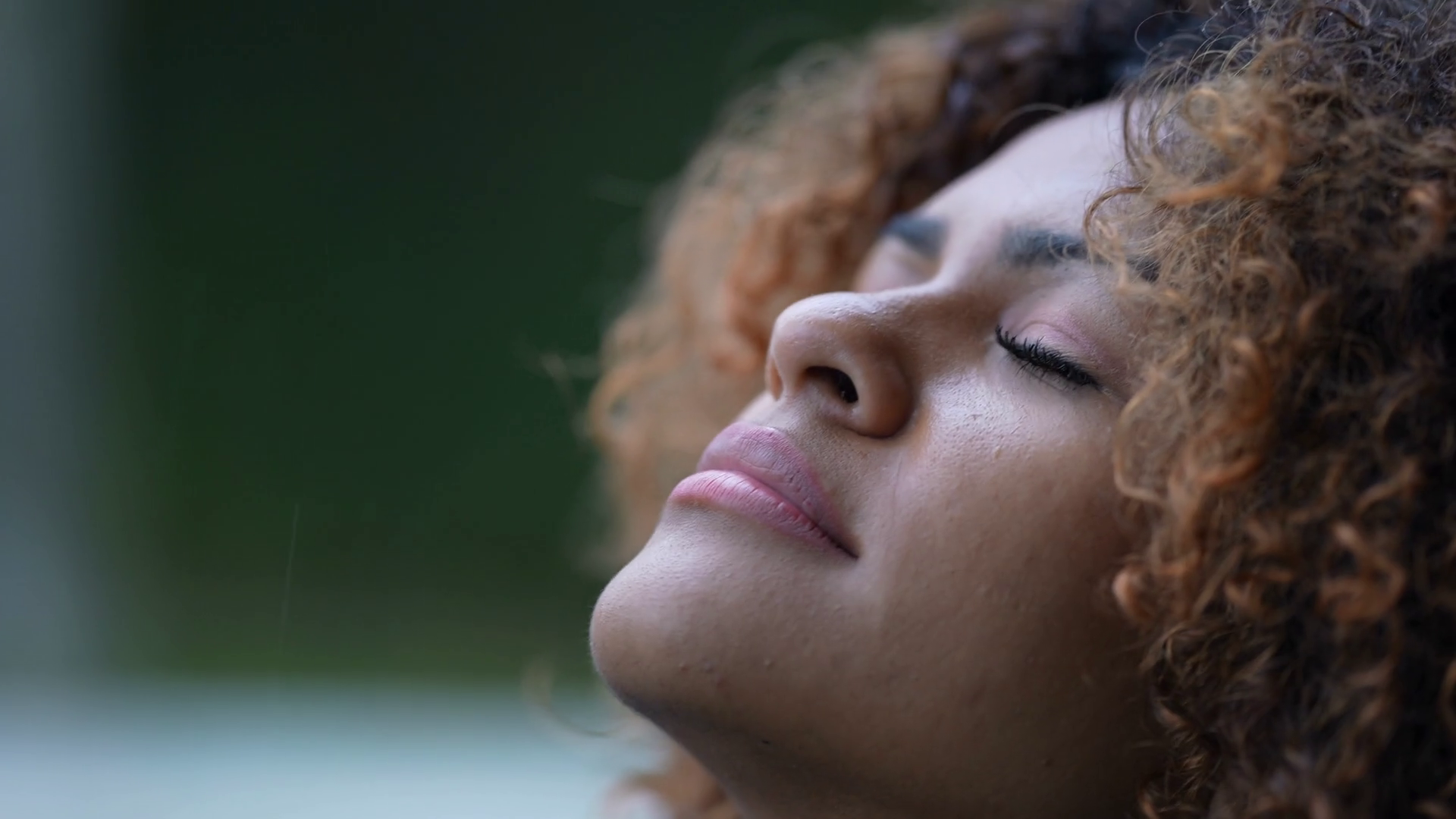 Black Woman Closing Eyes During Drizzle Day Stock Footage SBV-348715482 ...