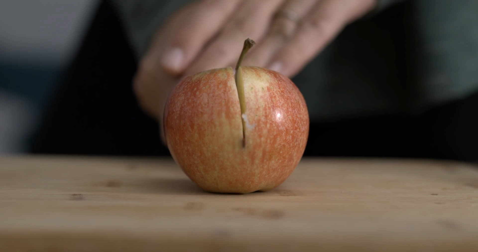 Slicing Apple Fruit In Half With Knife Stock Footage SBV-348491186 ...