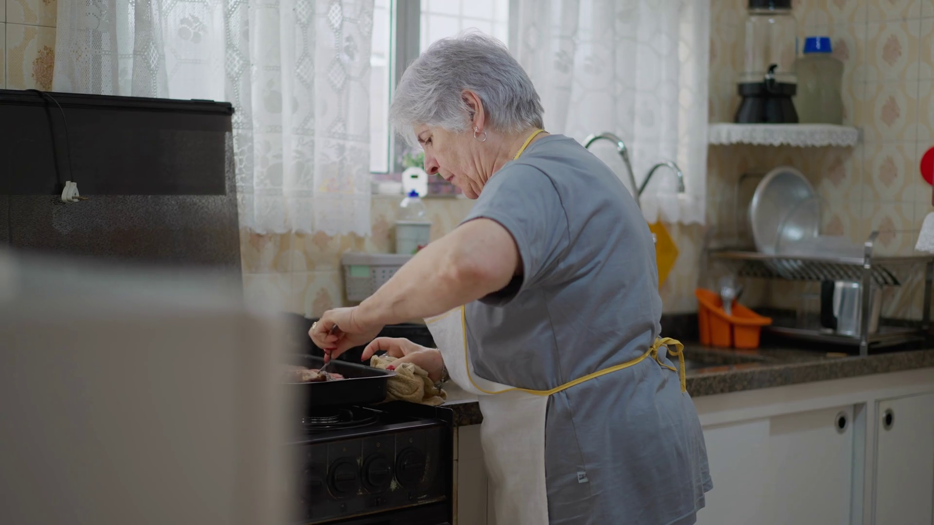 Candid Senior Woman Cooking At Home Kitchen Stock Footage SBV348510879(00)