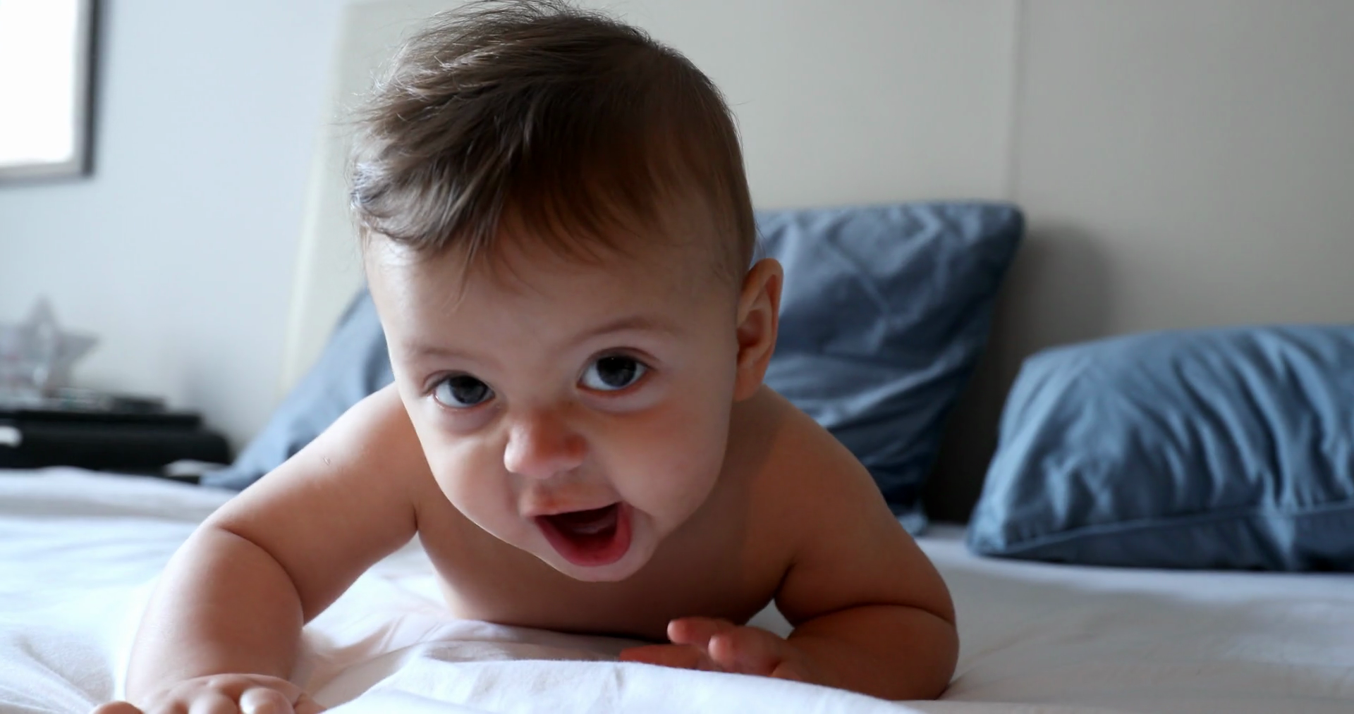 Baby Face In Bed Looking At Camera Stock Footage SBV348527005