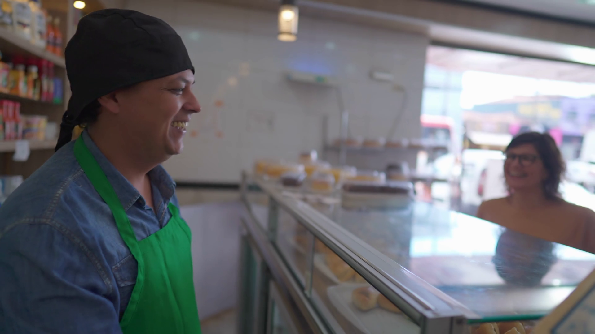 Happy Employee Behind Deli Counter Stock Footage SBV348499804