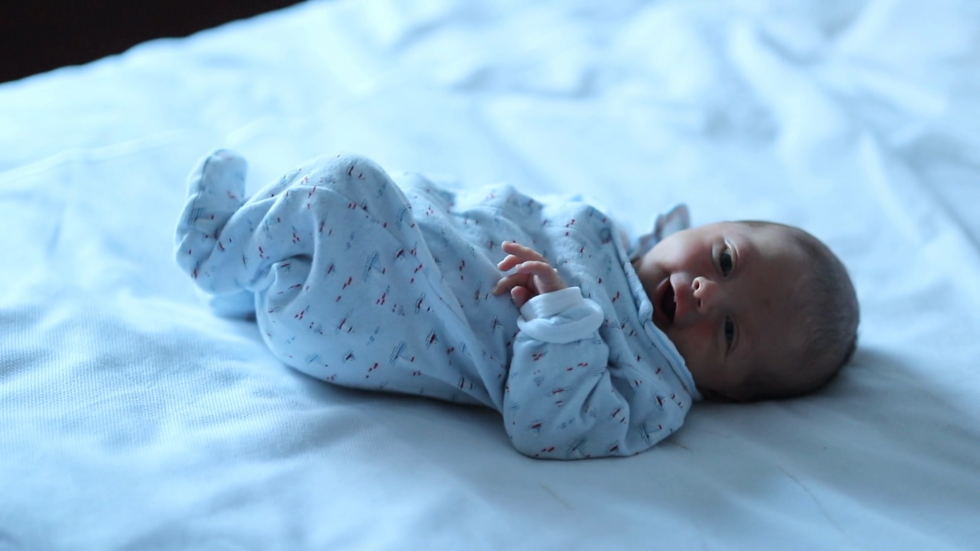 Tiny Stretches Newborn Baby's Gentle Body Stock Footage SBV348431590