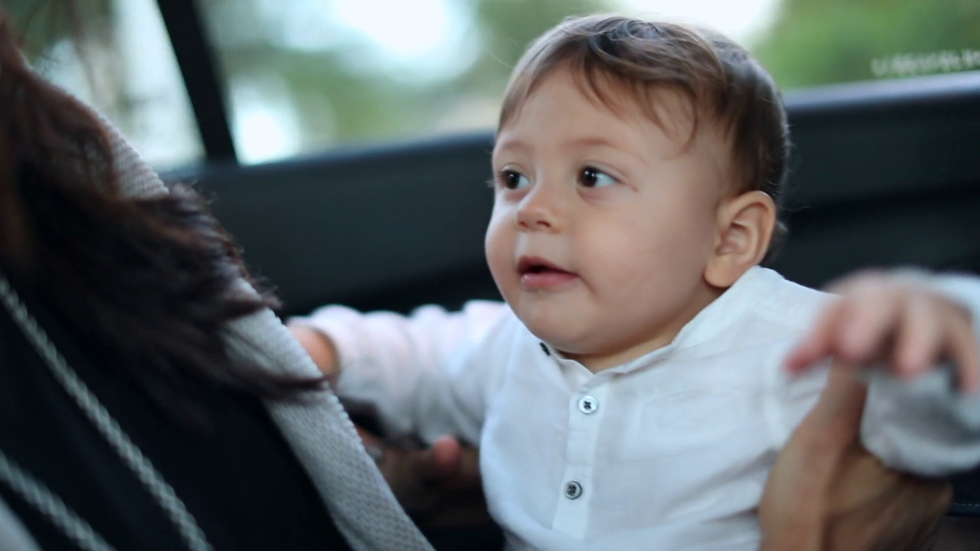Mother Holding Baby In Backseat Of Taxi Stock Footage SBV348540161