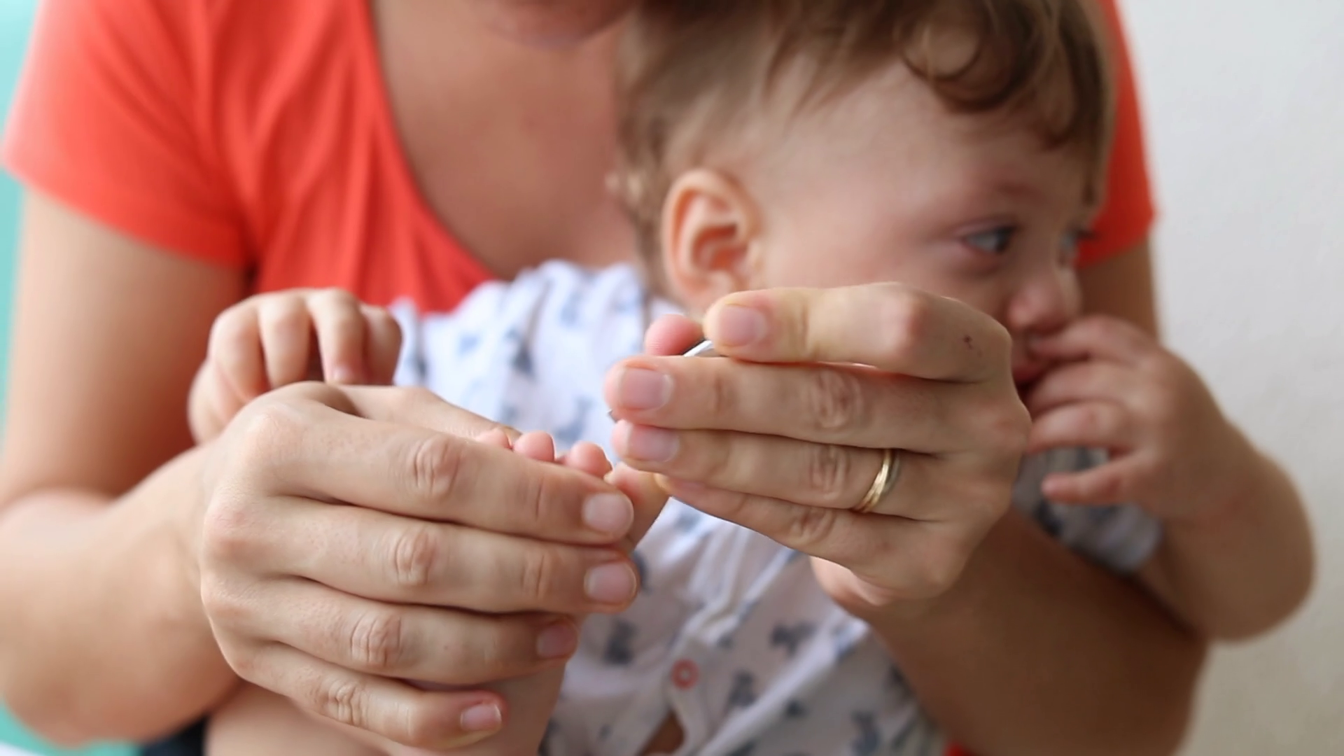 Mother Clipping Crying Baby's Toe Nails Stock Footage SBV-348540782 ...