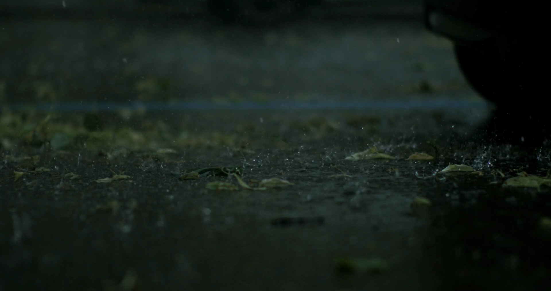 Rain Hits Asphalt In Slow Motion Scattering Stock Footage SBV-352357806 ...