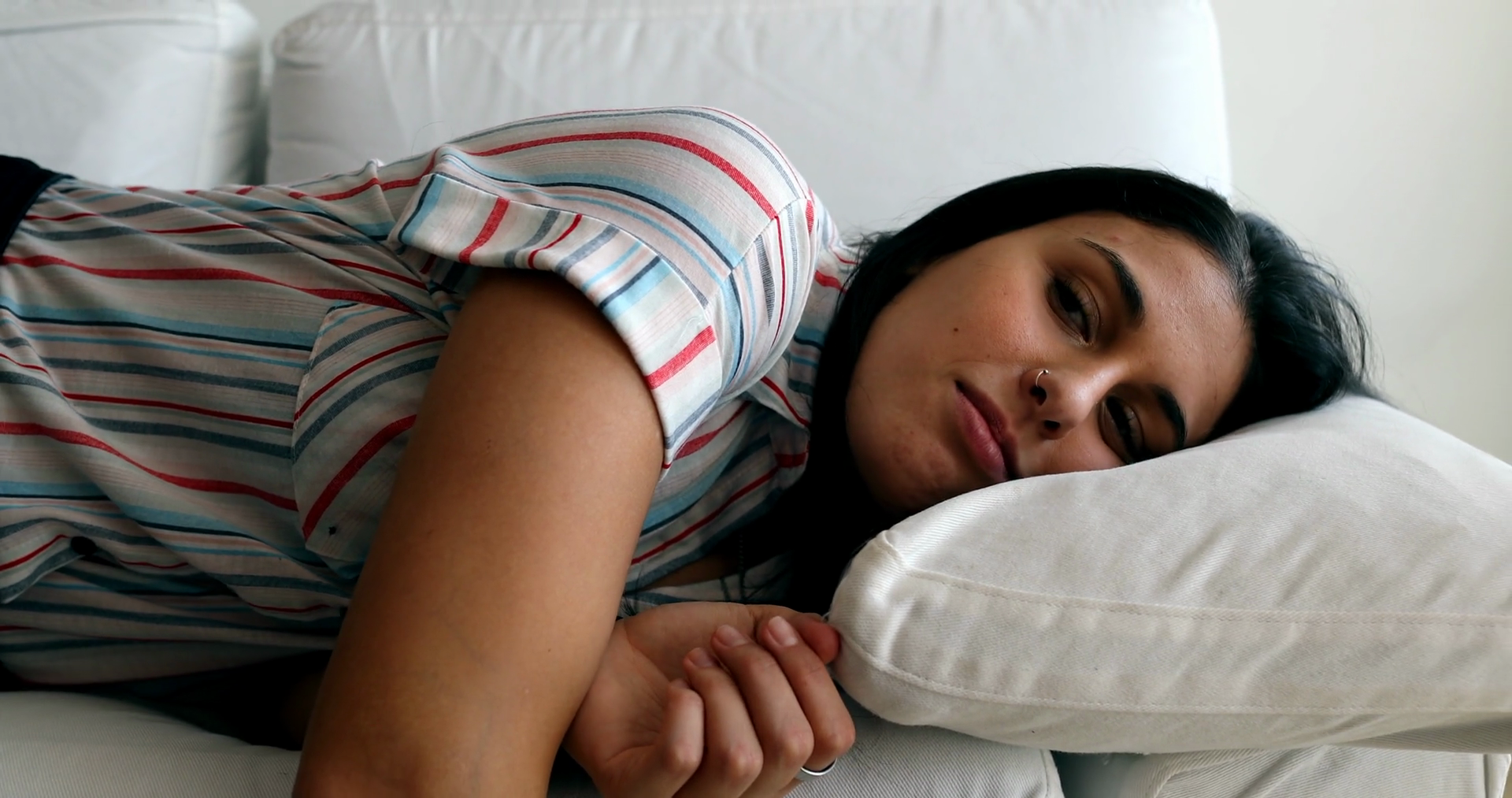 Tired Young Woman Slouching On Sofa Long Day Stock Footage SBV ...