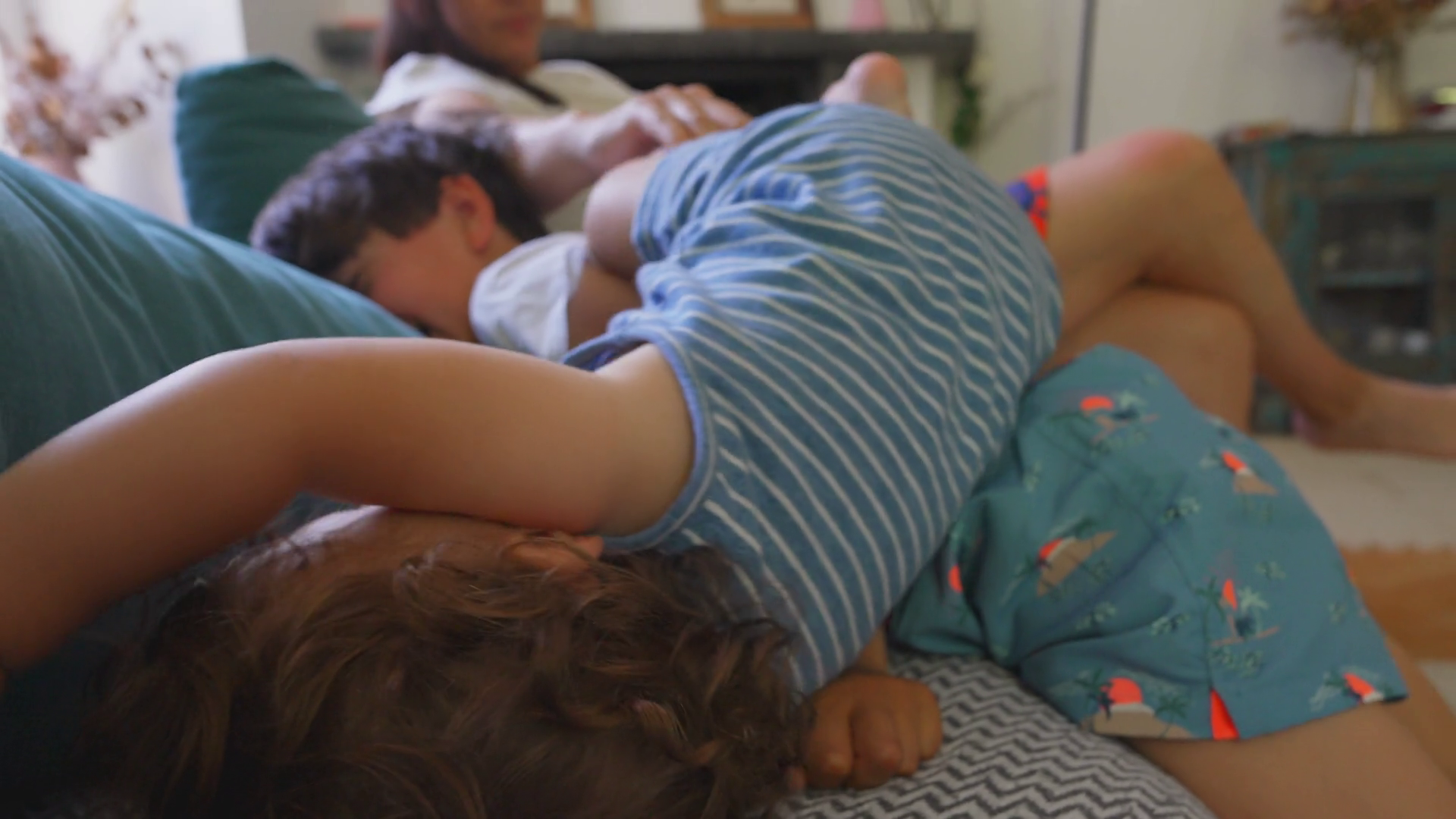 Toddler Sprawled Across Older Brothers Lap Stock Footage SBV-352476872 ...
