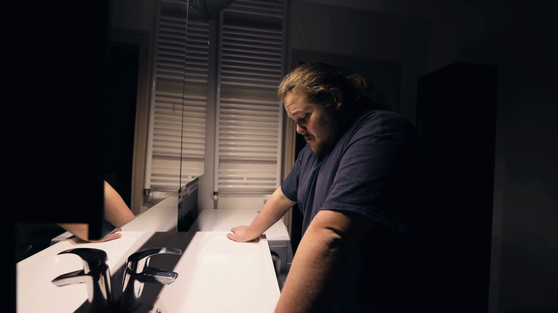 videoblocks-troubled-young-man-looking-at-bathroom-mirror-suffering-mental-illness-one-_hbx3oddh6h_thumbnail-1080_01.png